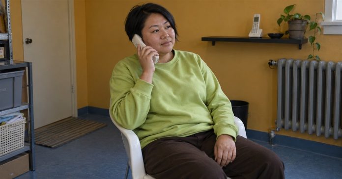 First reading — realistic cordless conversation 3676 Woman in a lime-green sweatshirt listening on an ivory cordless phone in an ochre-walled room.