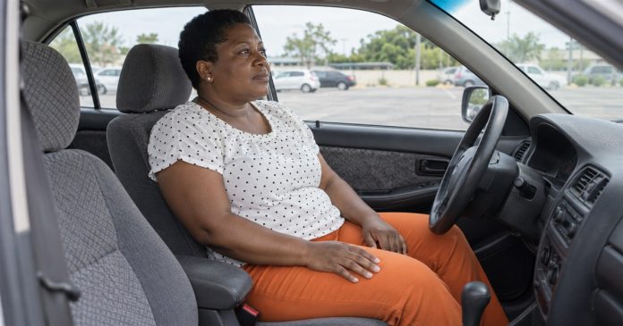 Psychic888 realistic parked car pause 3846 Woman taking a quiet pause in the driver's seat of a parked car.