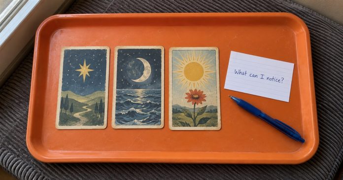 4025 realistic tarot question 20261004 Three symbolic cards and a handwritten question, What can I notice?, on an orange tray